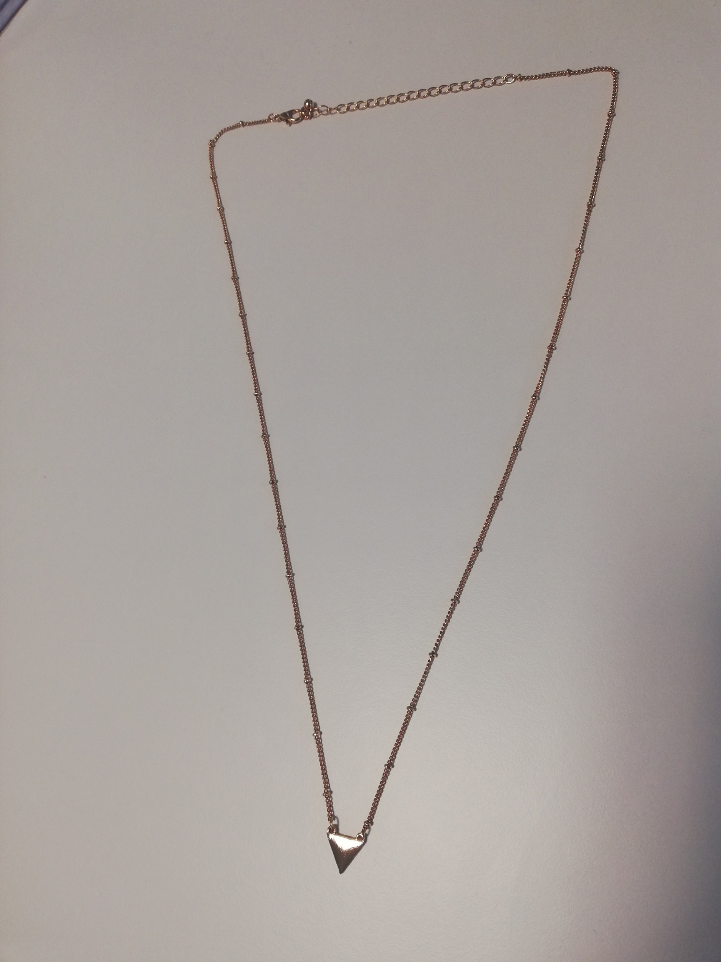 Collier en or avec un triangle plat en or    Prix 20,60€ Reste 1 exemplaire